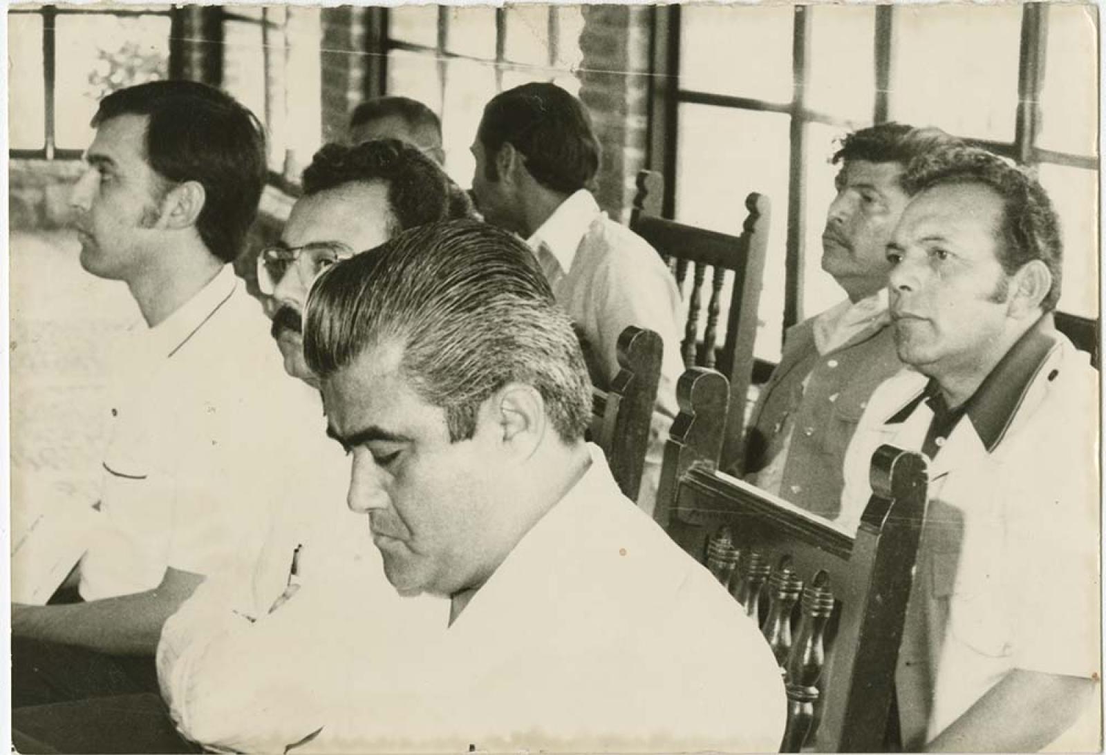 Alfonso González y acompañantes en reunión.