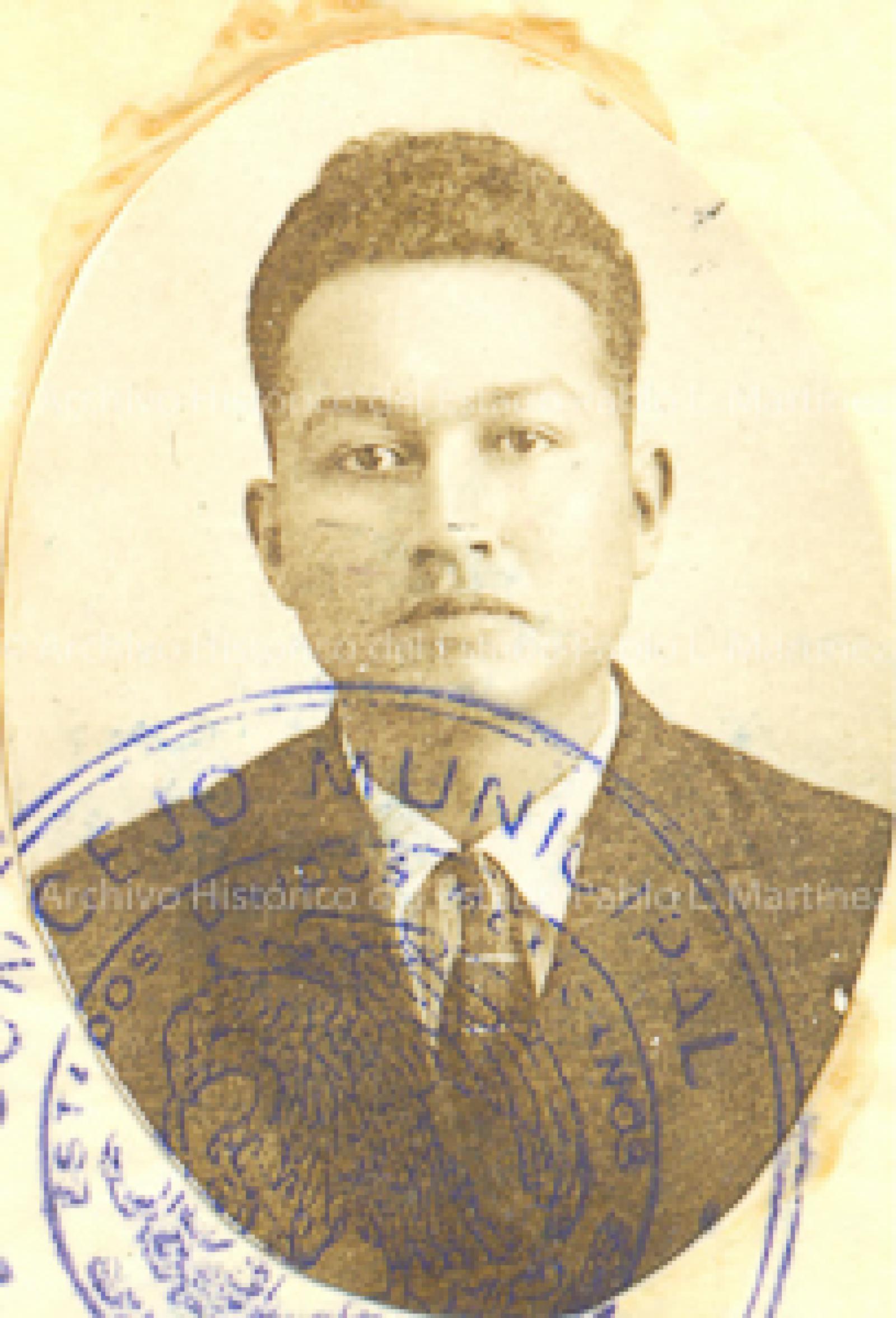 Carlos F. Flores.