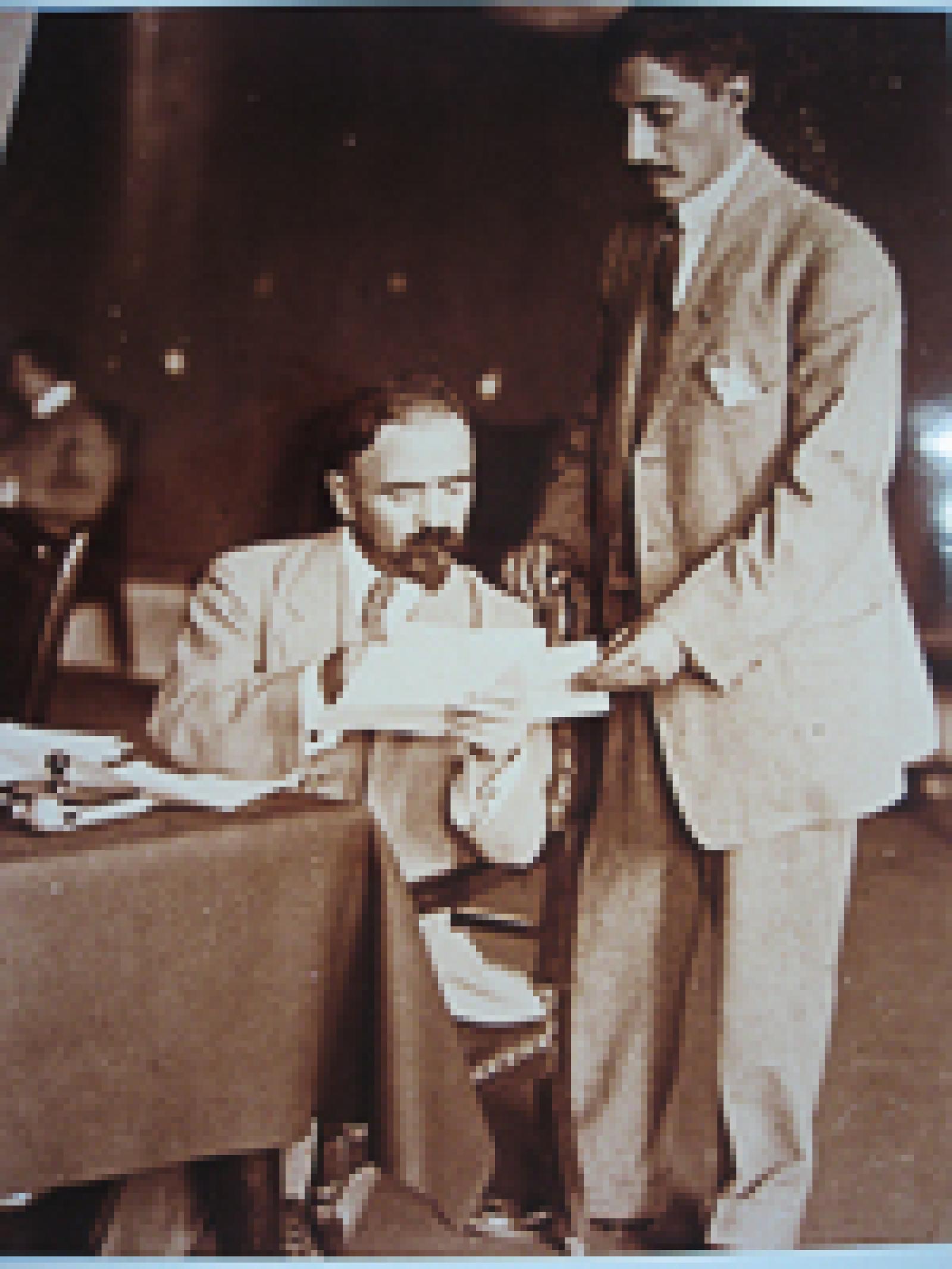 Francisco I. Madero en acuerdo con su secretario particular don Juan Sánchez Azcona.