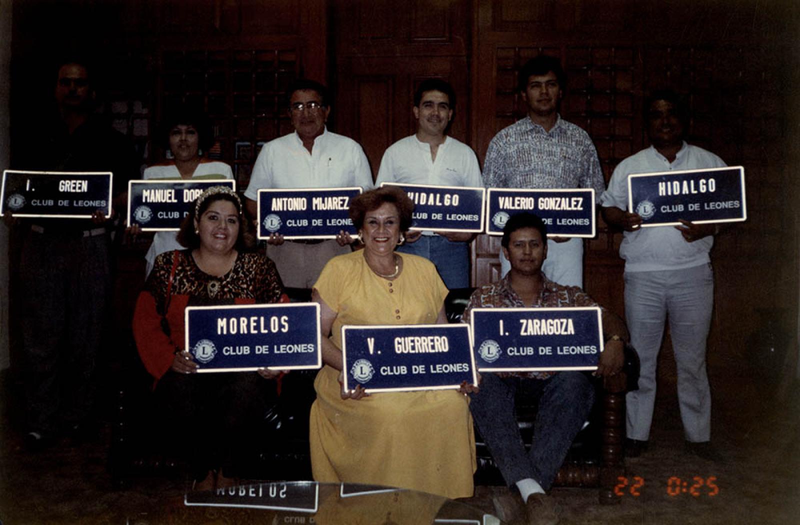 Integrantes del Club de Leones, retrato de grupo.