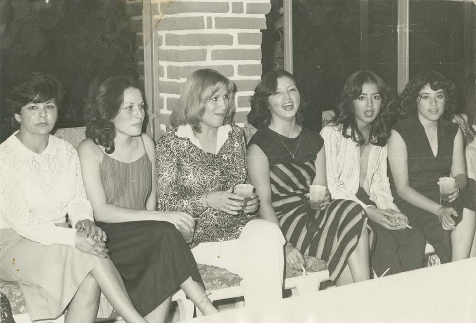 Mujeres, en evento social.