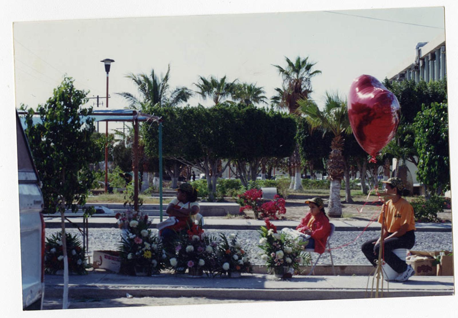 Mujeres en venta de flores.